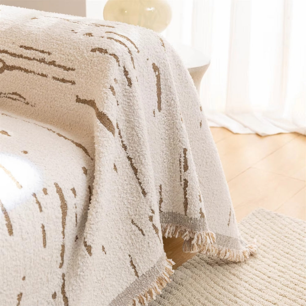 Junips | Driftwood Tassel Sofa Cover