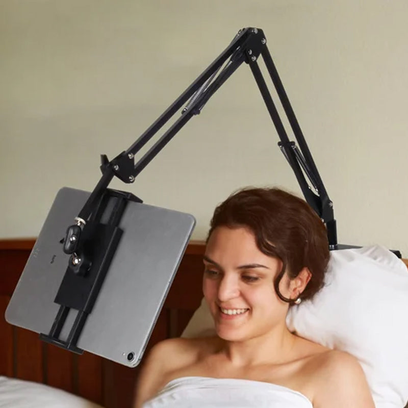 Junips | Extendable, concealed phone/tablet holder at the bed