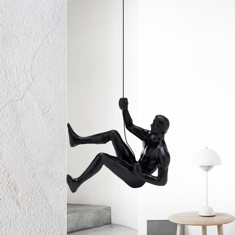 Junips | Climbing wall hanging statues