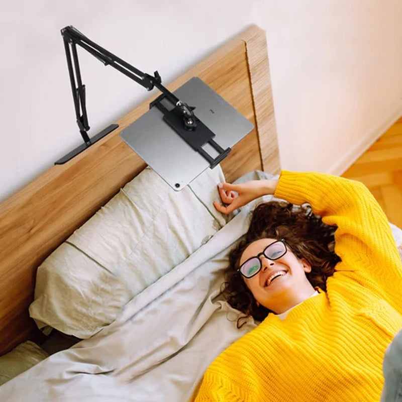 Junips | Extendable, concealed phone/tablet holder at the bed