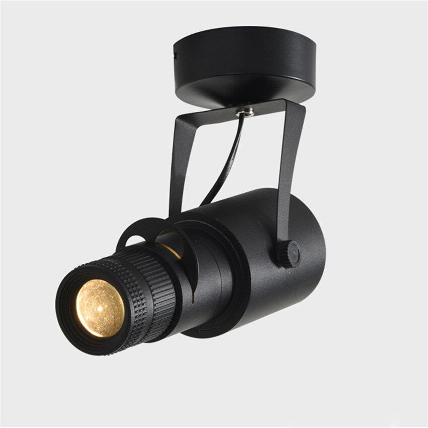 Junips | Adjustable LED spotlight - focus light background