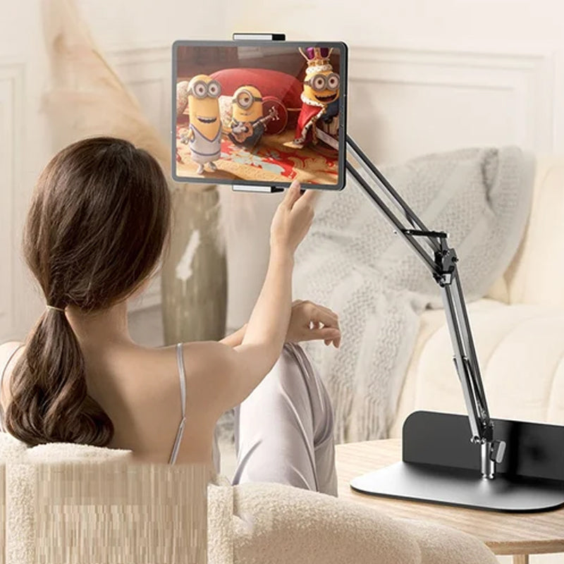 Junips | Extendable, concealed phone/tablet holder at the bed