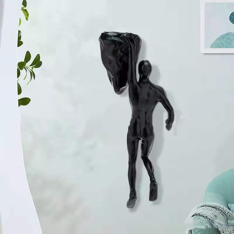 Junips | Climbing wall hanging statues
