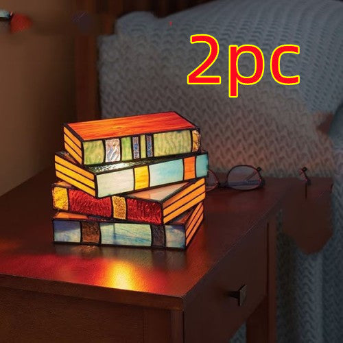 Junips | Desk lamp with stacked books