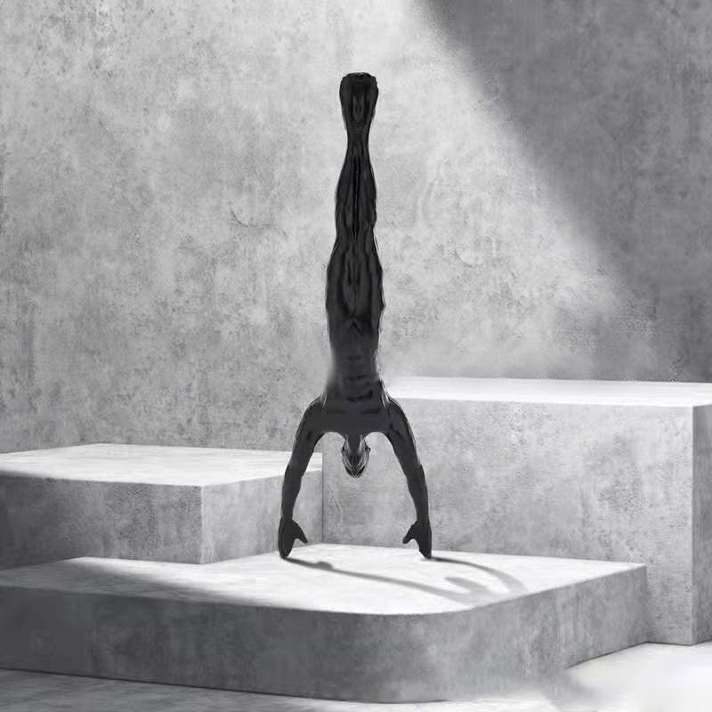 Junips | Climbing wall hanging statues