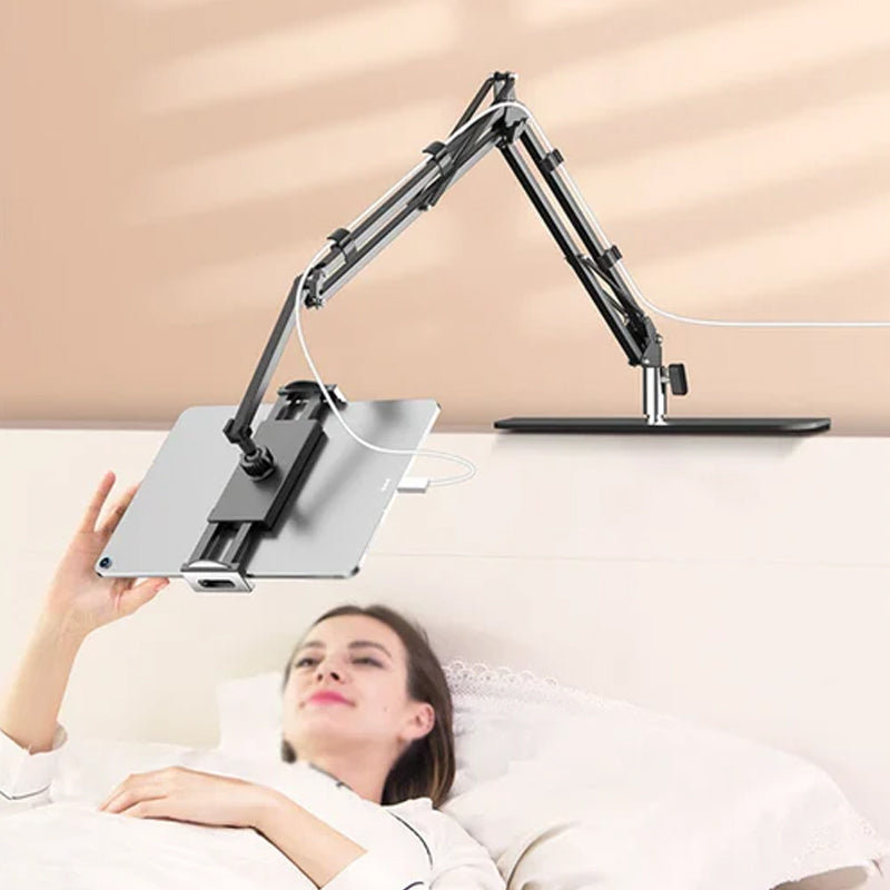 Junips | Extendable, concealed phone/tablet holder at the bed