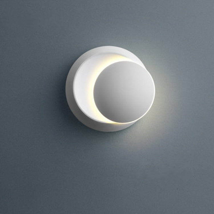 Junips | Contemporary Nordic Iron Round Eclipse Rotatable LED Wall Light for Nightstand