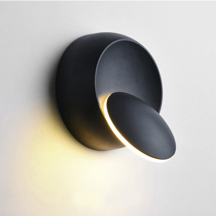 Junips | Contemporary Nordic Iron Round Eclipse Rotatable LED Wall Light for Nightstand