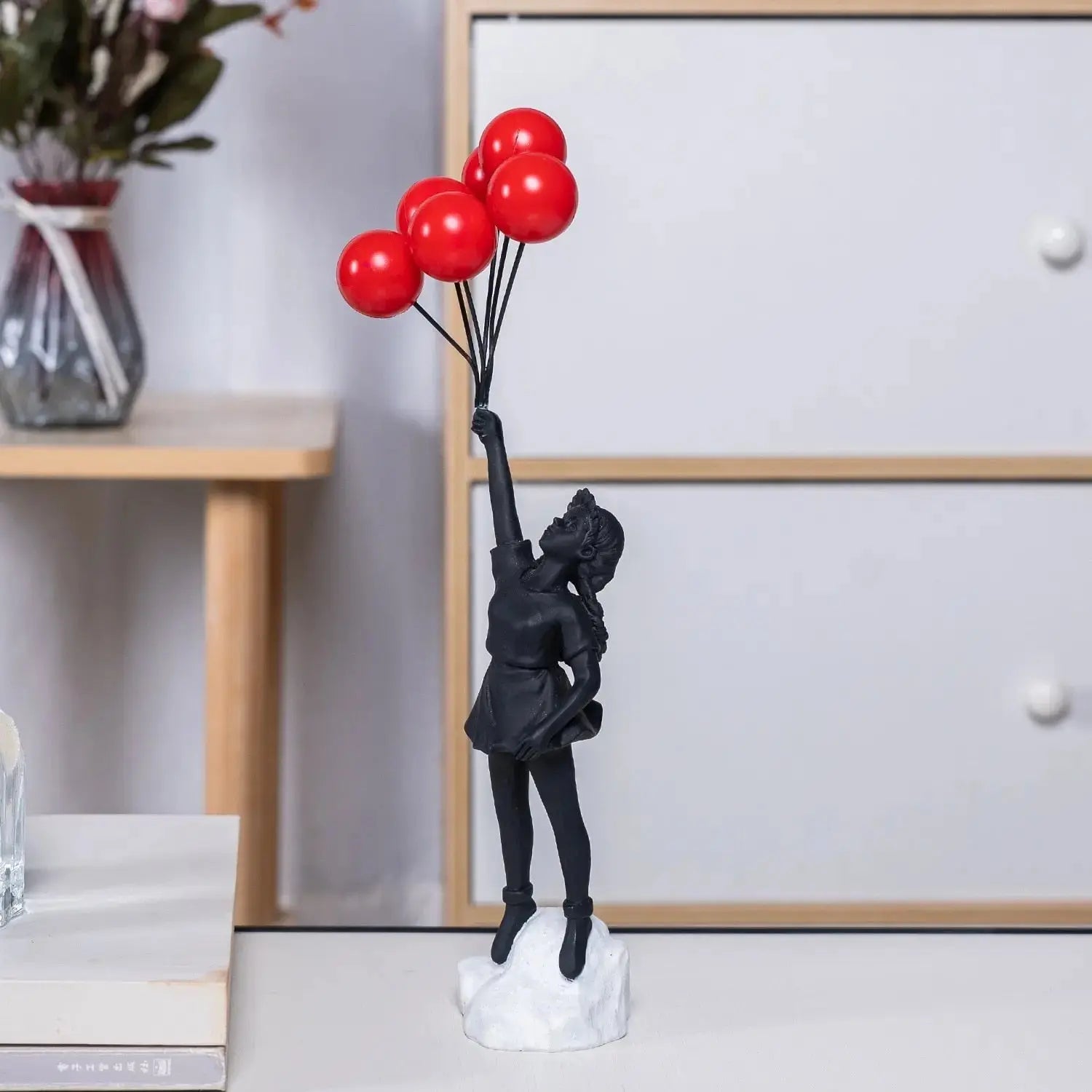 Junips | Banksy flying Balloon Girl Statue