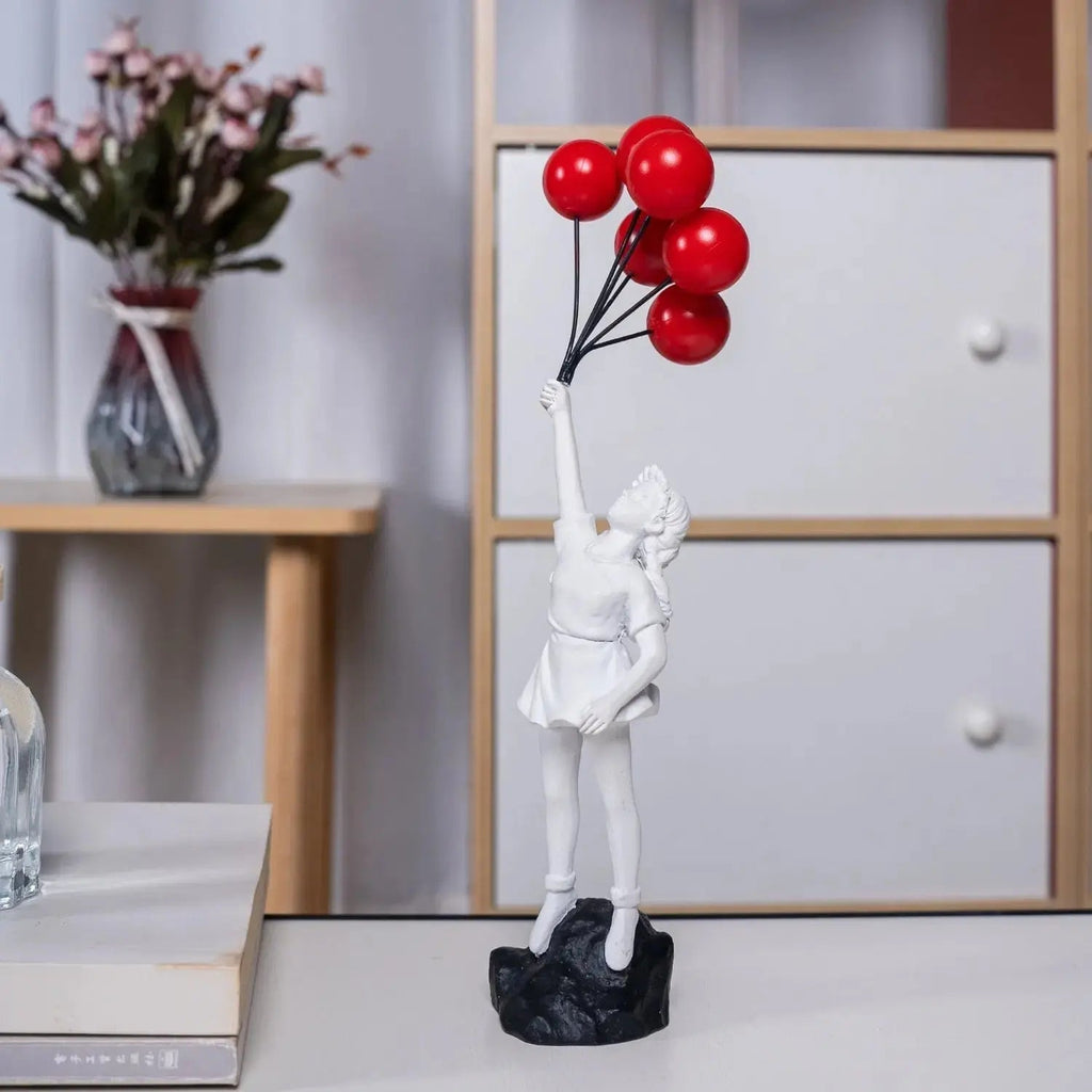 Junips | Banksy flying Balloon Girl Statue