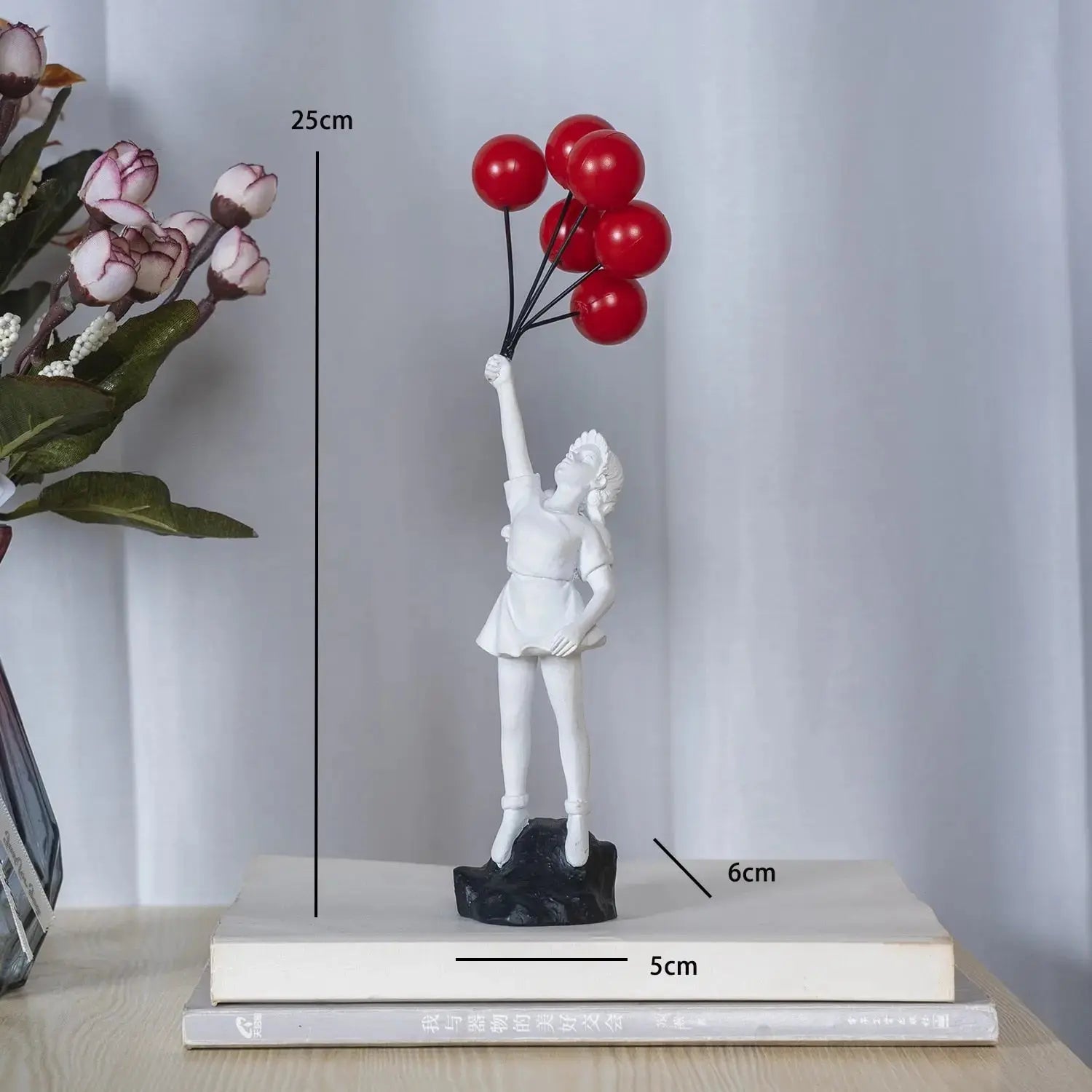 Junips | Banksy flying Balloon Girl Statue