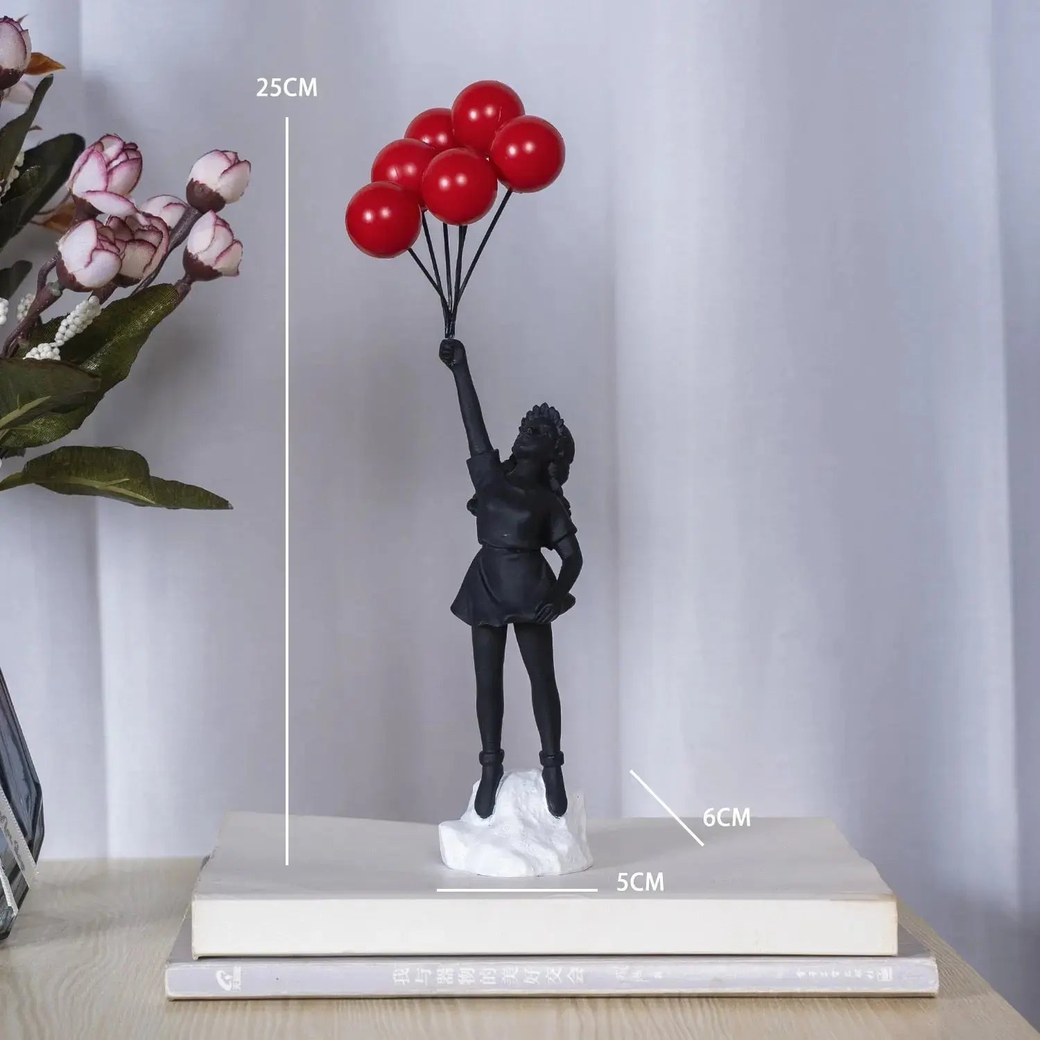 Junips | Banksy flying Balloon Girl Statue