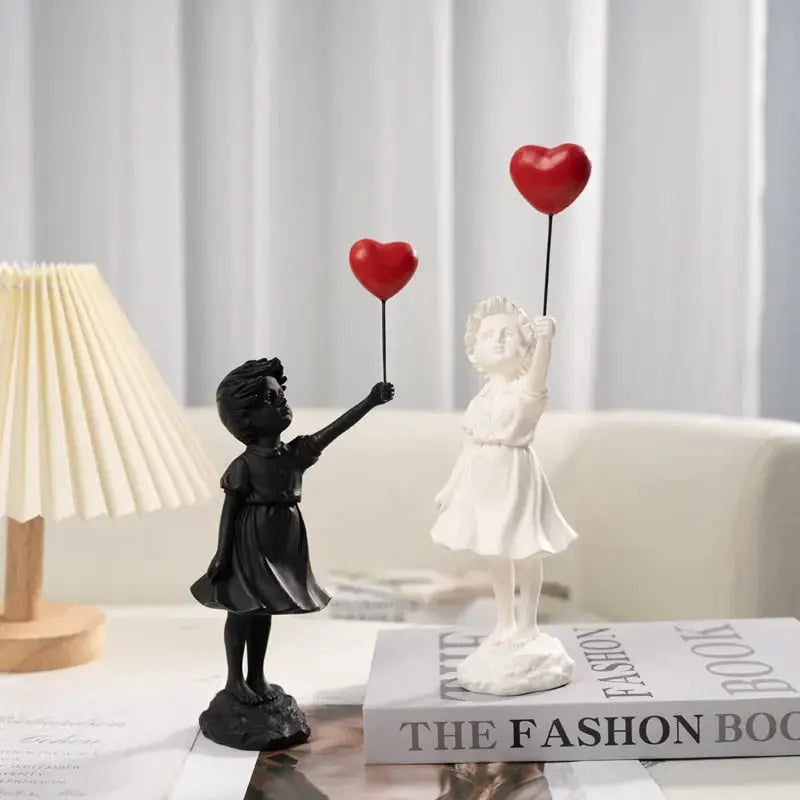 Junips | Banksy flying Balloon Girl Statue