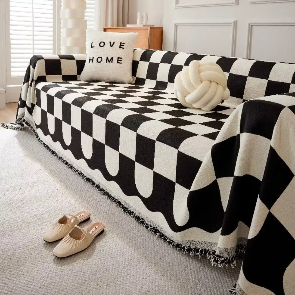 Junips | Chess Board Chic Tasseled Sofa Cover