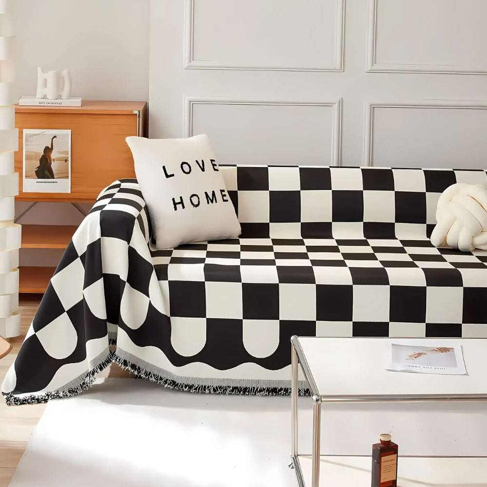 Junips | Chess Board Chic Tasseled Sofa Cover