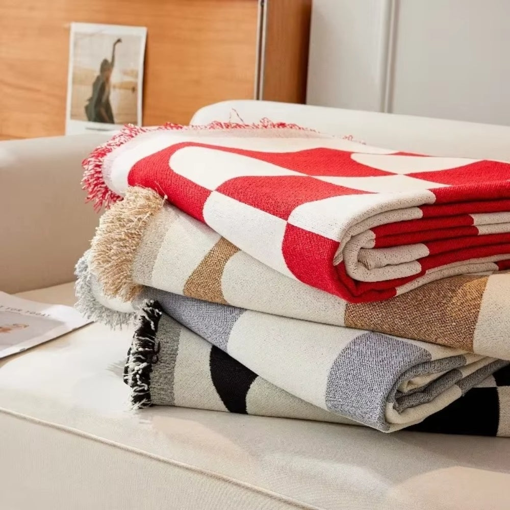 Junips | Chess Board Chic Tasseled Sofa Cover