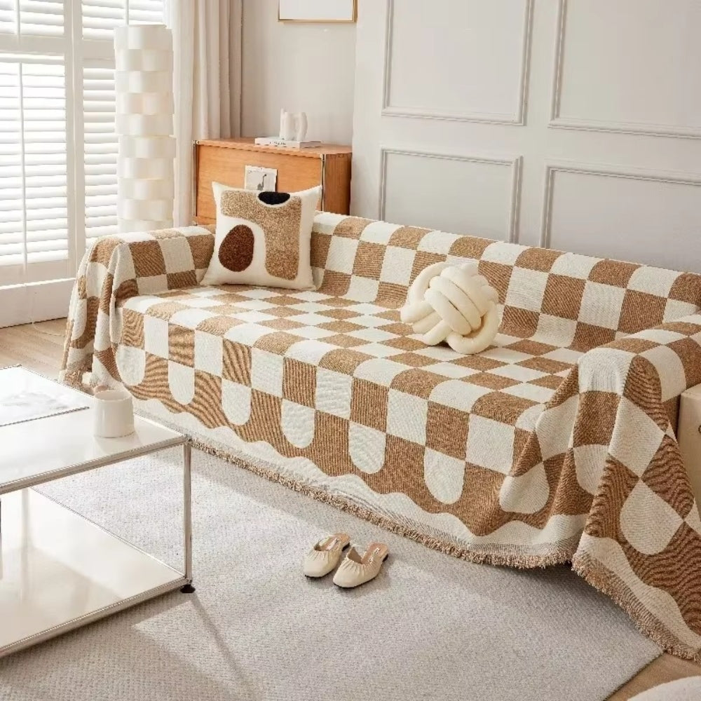 Junips | Chess Board Chic Tasseled Sofa Cover
