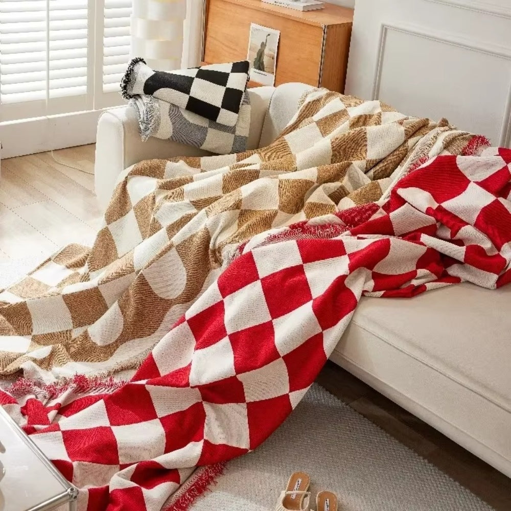 Junips | Chess Board Chic Tasseled Sofa Cover