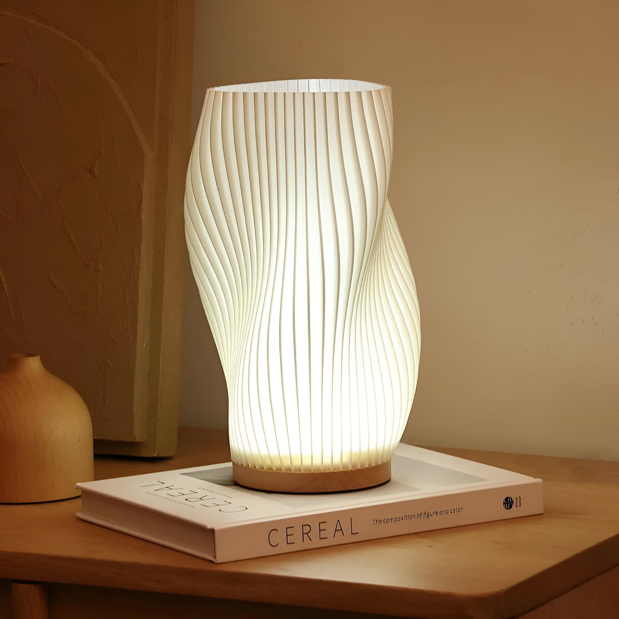 Junips | DreamWave - Modern cream-colored 3D wave lamp with elegant metal base