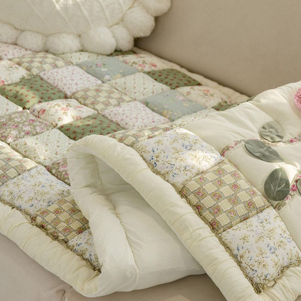 Junips | Floral Bloom Quilted Sofa Cover