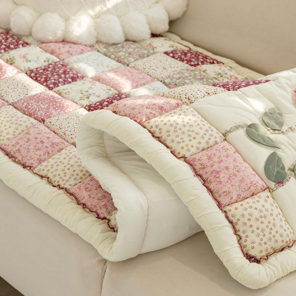 Junips | Floral Bloom Quilted Sofa Cover
