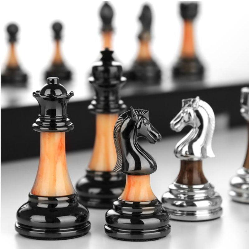 Junips | Luxurious chess set made of metal with a large 45 cm wooden board