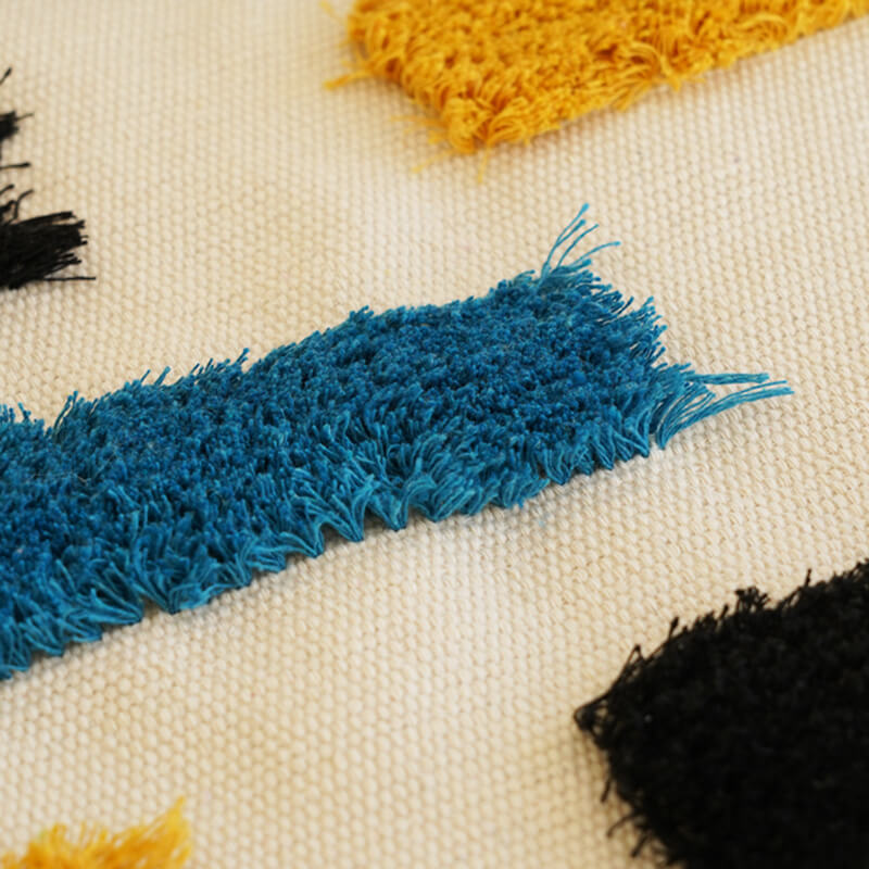Junips | Handwoven geometric pattern tassel wall hanging