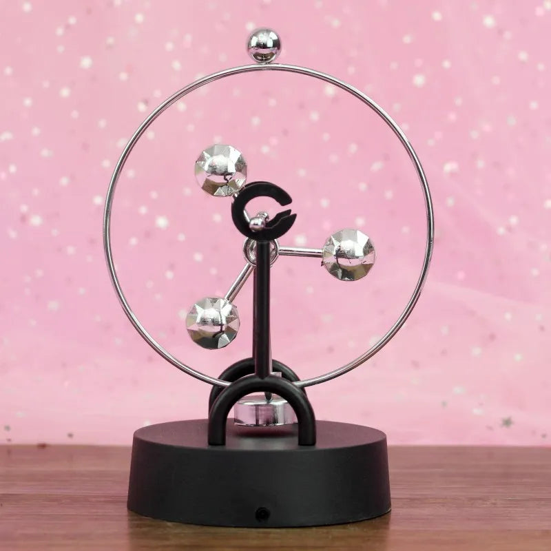 Junips | Newton Pendulum Ball, which represents perpetual motion