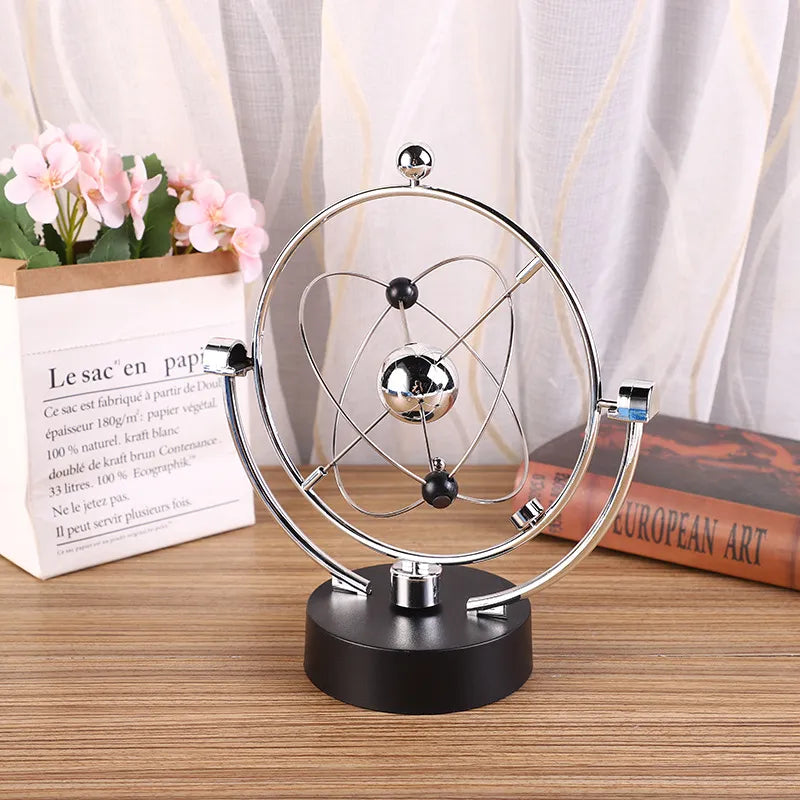 Junips | Newton Pendulum Ball, which represents perpetual motion