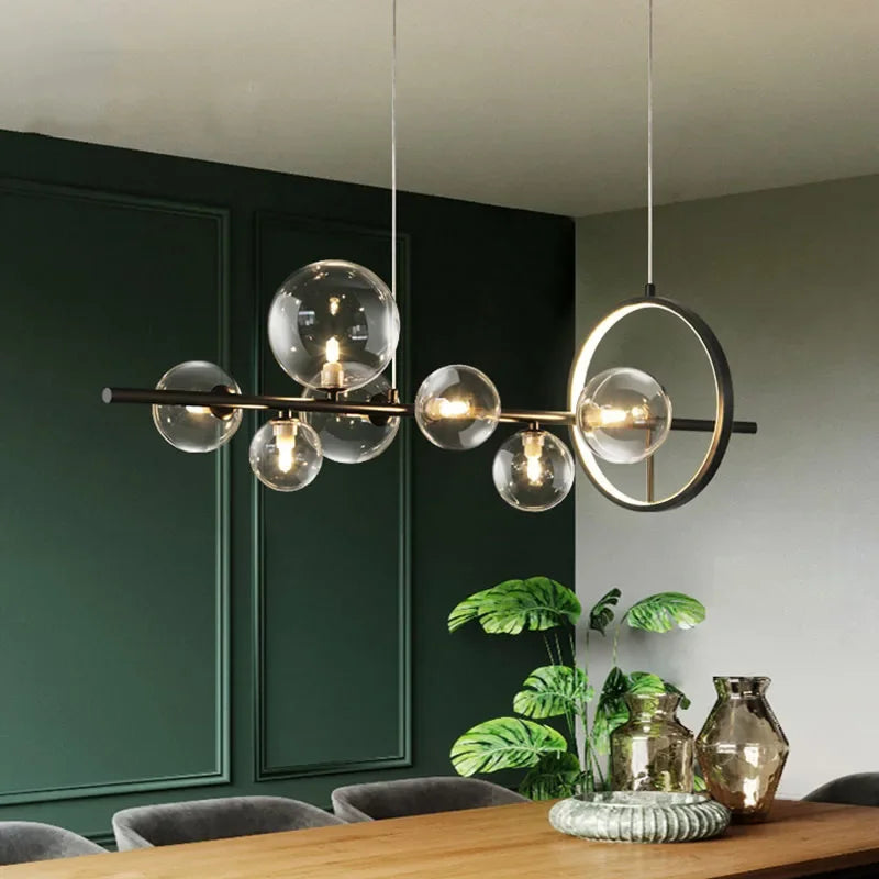 Junips | Modern creative metal chandelier lighting: 7/10 clear glass bubbles, long round design with G9 light socket