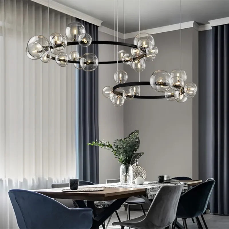 Junips | Modern creative metal chandelier lighting: 7/10 clear glass bubbles, long round design with G9 light socket