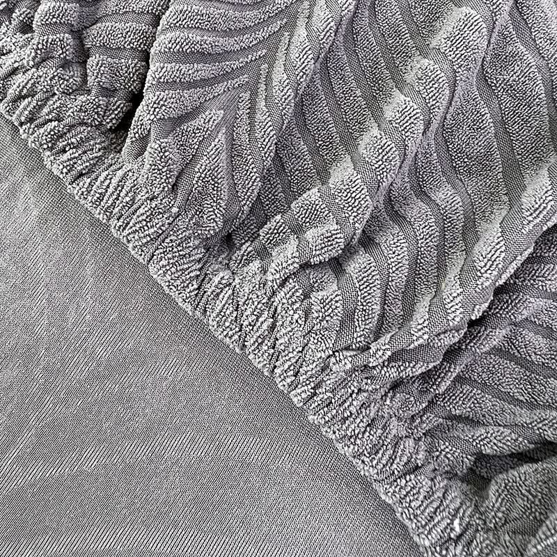 Junips | PlushSecure - Elegant Jacquard Sofa Cover for Non-Slip Comfort