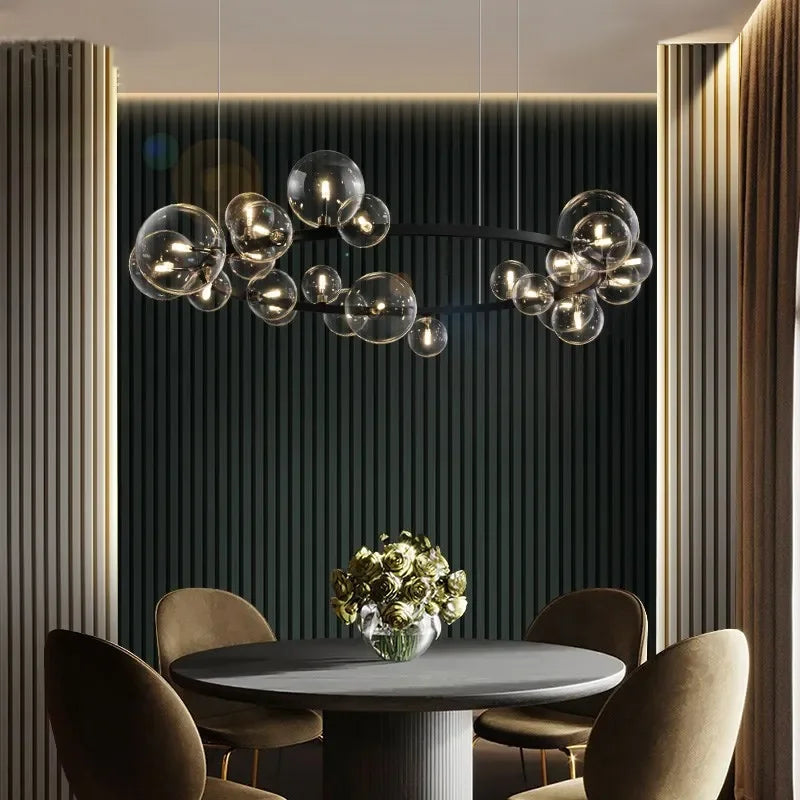 Junips | Modern creative metal chandelier lighting: 7/10 clear glass bubbles, long round design with G9 light socket