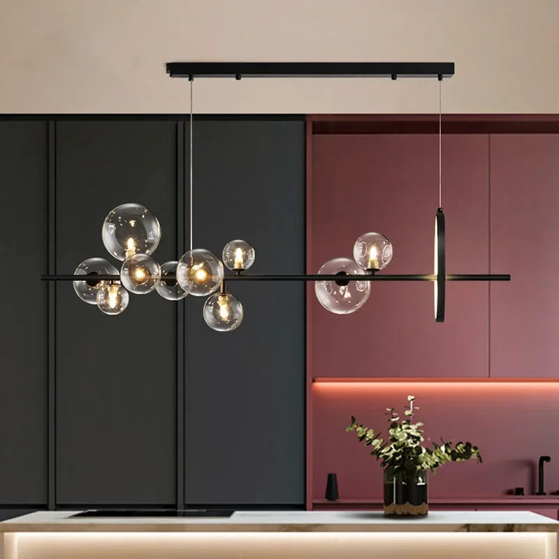 Junips | Modern creative metal chandelier lighting: 7/10 clear glass bubbles, long round design with G9 light socket