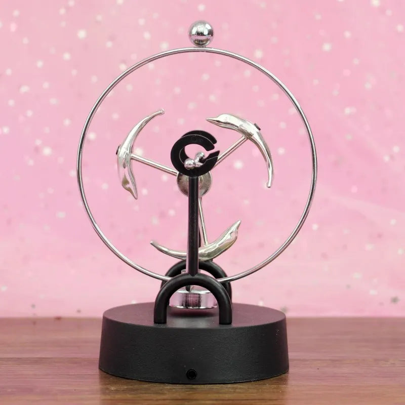 Junips | Newton Pendulum Ball, which represents perpetual motion