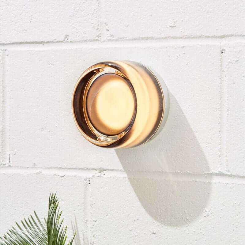 Junips | Futuristic and unique solid Plexiglass wall lamp