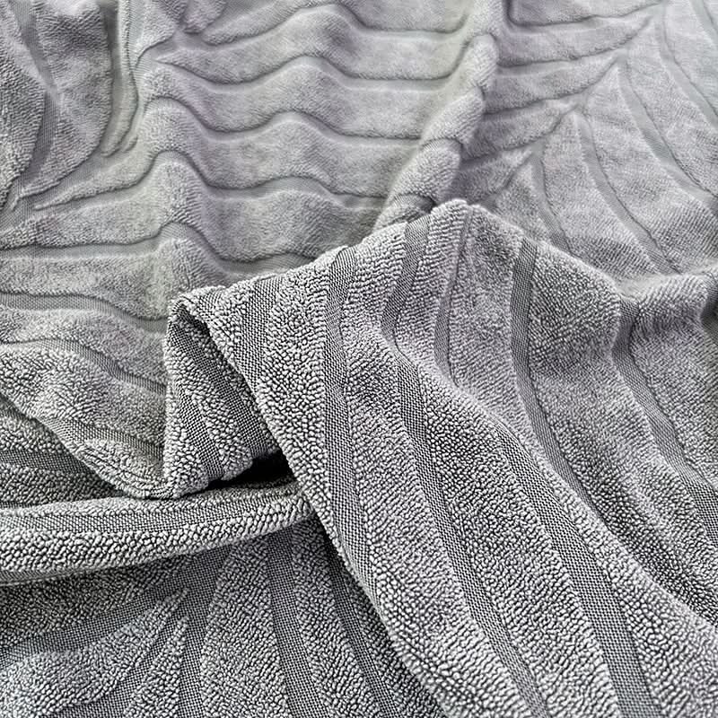 Junips | PlushSecure - Elegant Jacquard Sofa Cover for Non-Slip Comfort