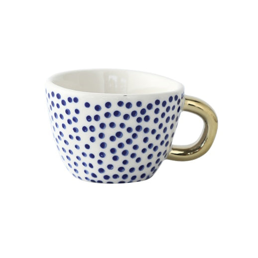 Junips | Cup with abstract geometric pattern and gold handle