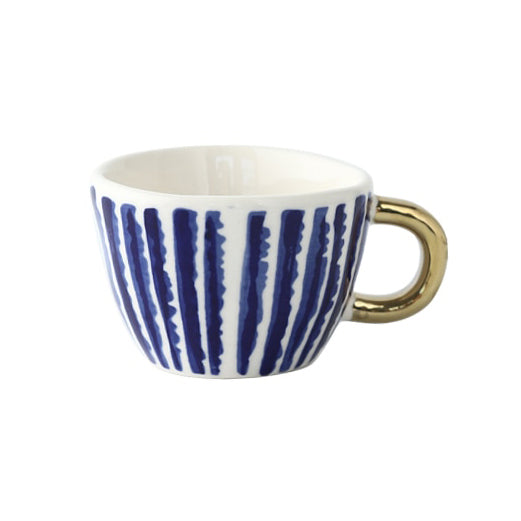 Junips | Cup with abstract geometric pattern and gold handle