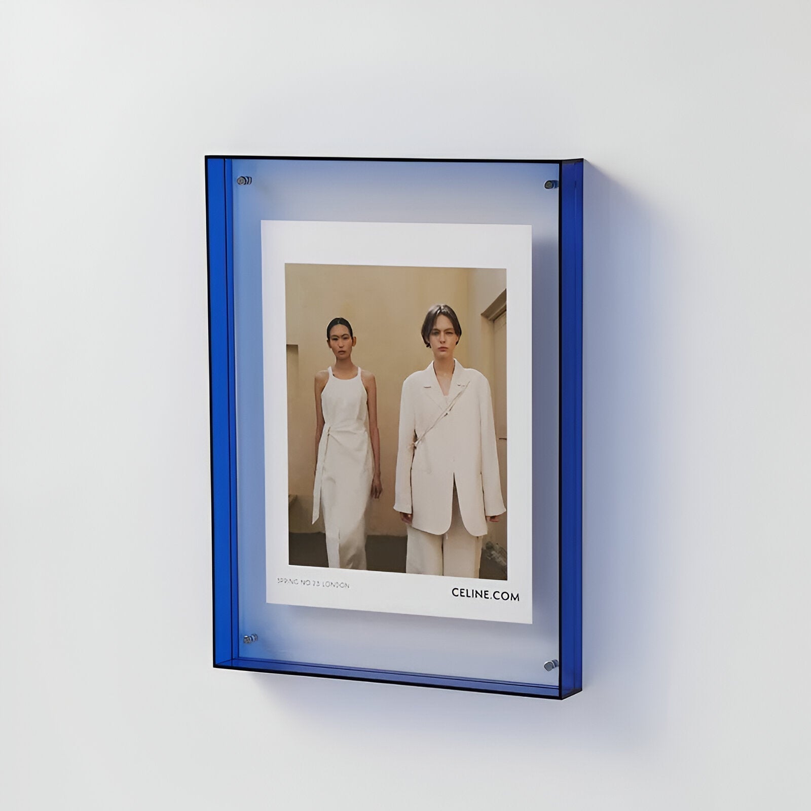 Junips | Colored transparent acrylic frame for modern displays