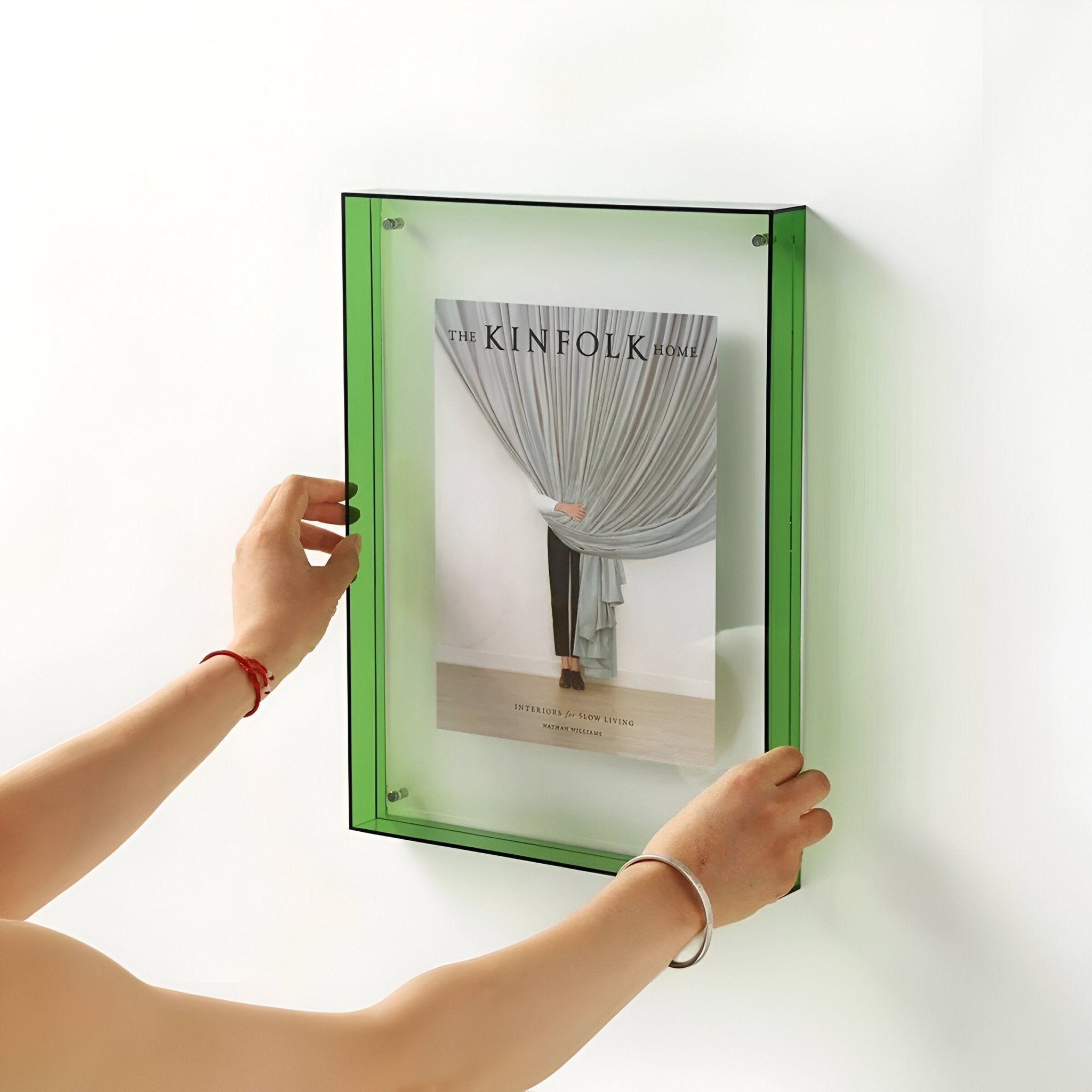 Junips | Colored transparent acrylic frame for modern displays