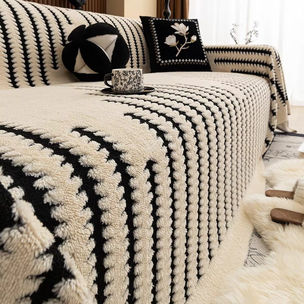Junips | CouchGuard – Plush sofa cover with non-slip backing