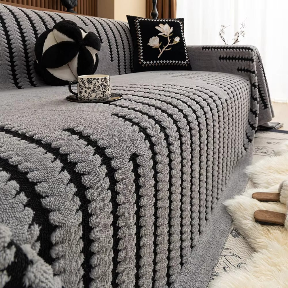 Junips | CouchGuard – Plush sofa cover with non-slip backing