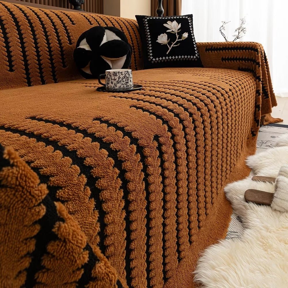 Junips | CouchGuard – Plush sofa cover with non-slip backing