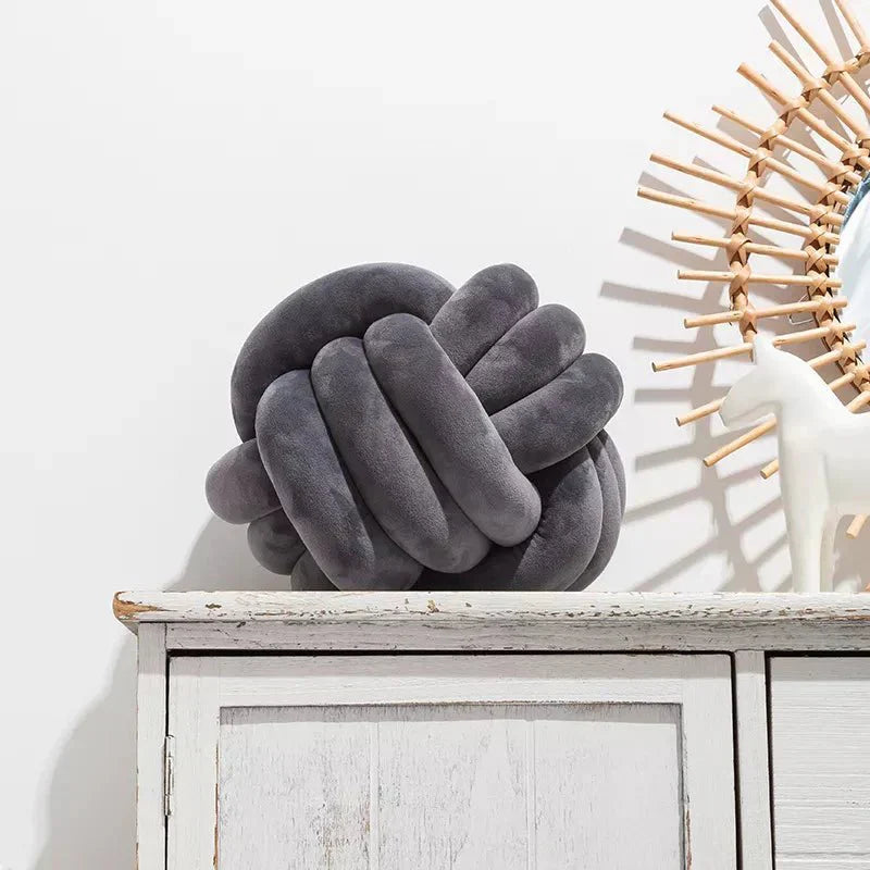 Junips | Decorative knotted suede-look ball soft cushion