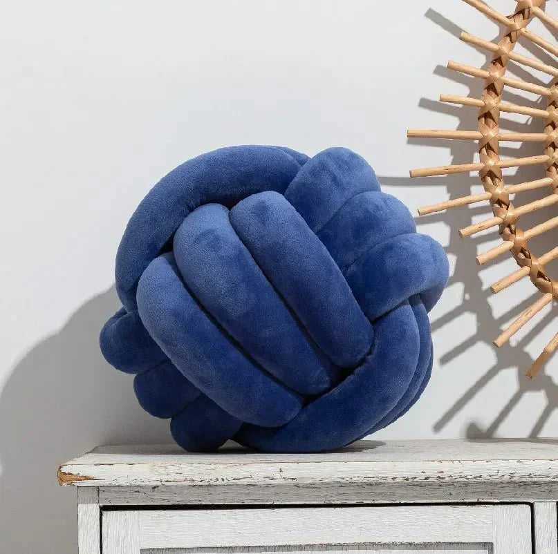 Junips | Decorative, soft cushion with knotted ball in suede look