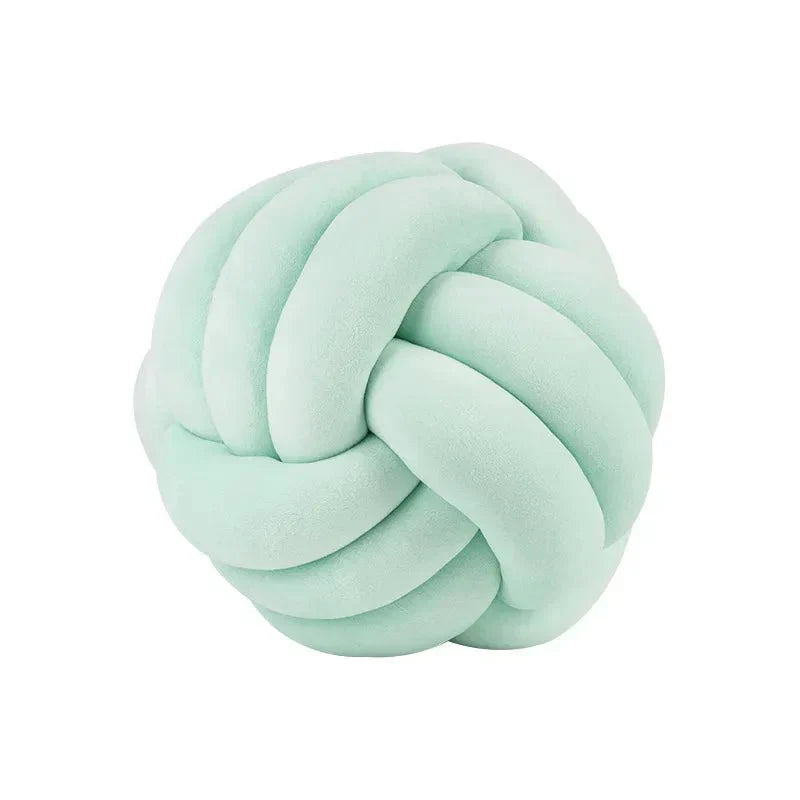 Junips | Decorative, soft cushion with knotted ball in suede look