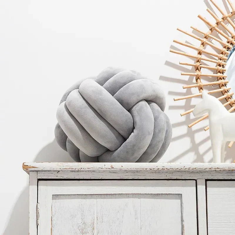 Junips | Decorative knotted suede-look ball soft cushion