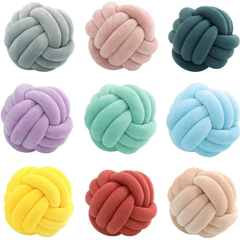 Junips | Decorative knotted suede-look ball soft cushion
