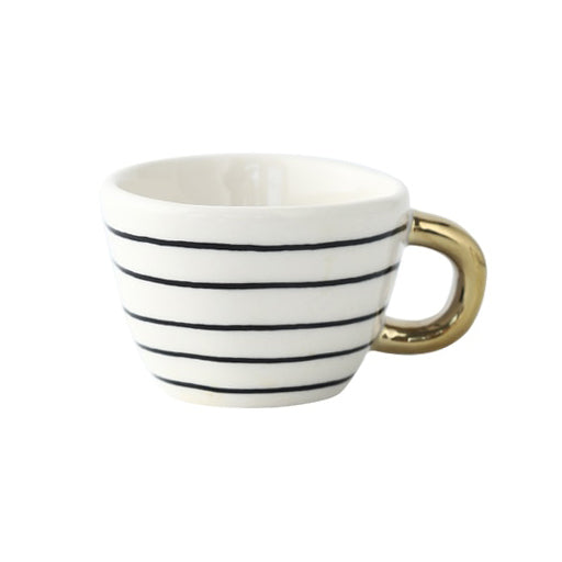 Junips | Cup with abstract geometric pattern and gold handle